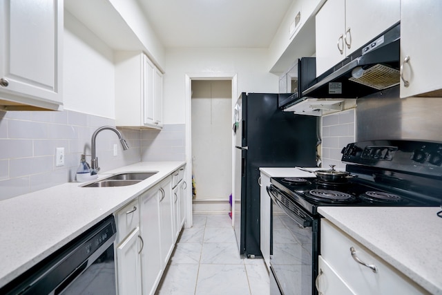 kitchen featuring white cabinets, sink, black appliances, and backsplash