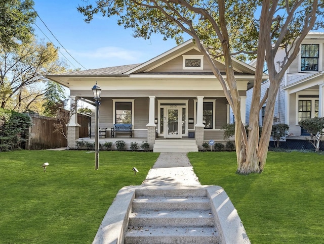 view of front facade featuring a porch and a front lawn