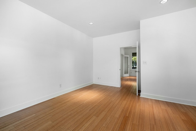 empty room featuring hardwood / wood-style floors