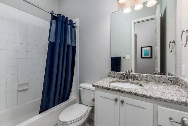 full bathroom featuring shower / bath combo with shower curtain, vanity, and toilet