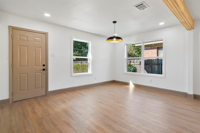 interior space featuring a wealth of natural light and light hardwood / wood-style flooring