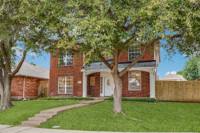 view of front facade with a front yard