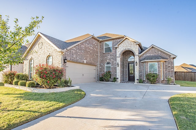 view of front of property with a front lawn