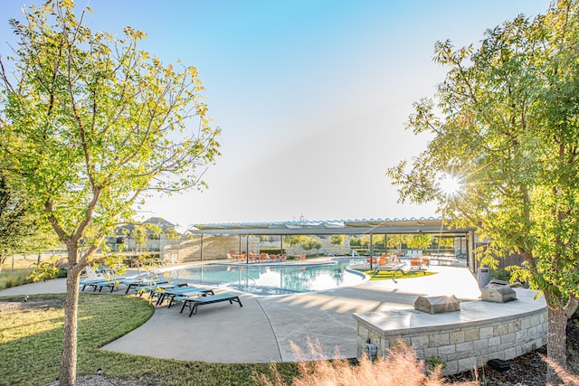 view of swimming pool featuring a patio