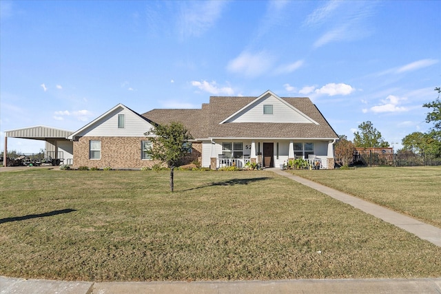 view of front of property with a porch, a carport, and a front lawn