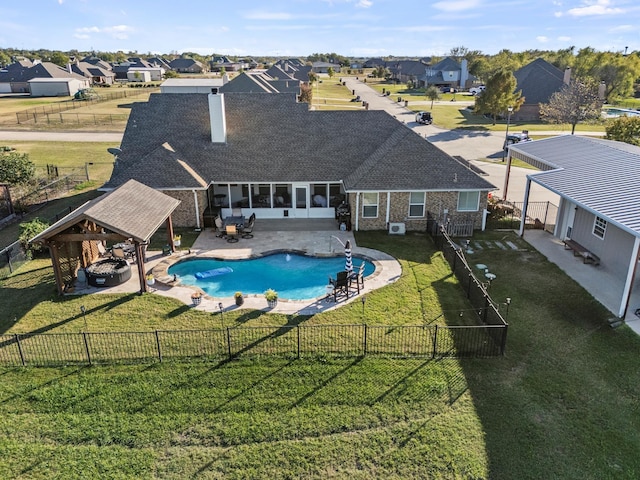 view of swimming pool with a gazebo, a yard, and a patio area