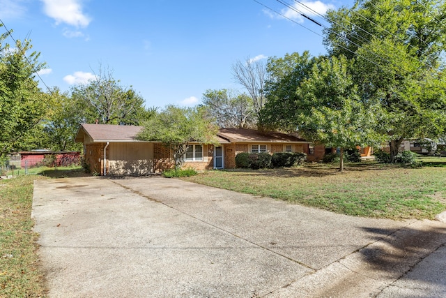 ranch-style house featuring a front lawn