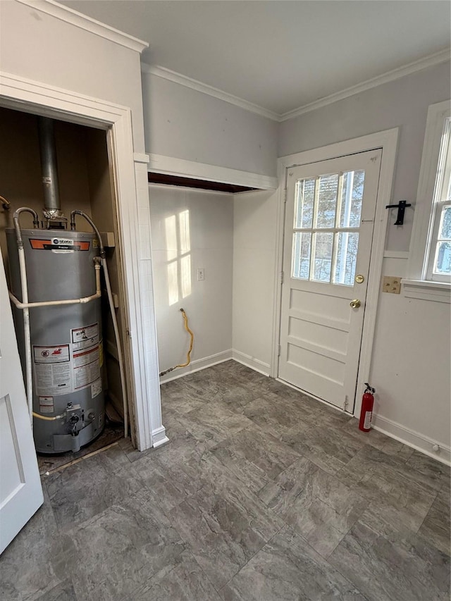 utility room featuring water heater