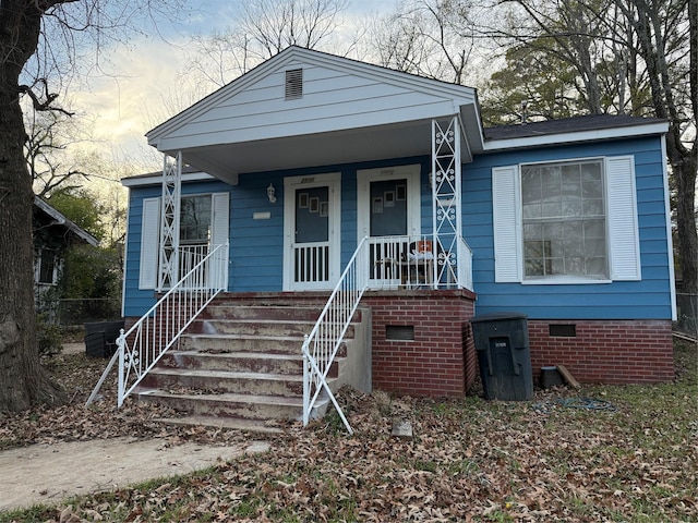 bungalow-style home with covered porch