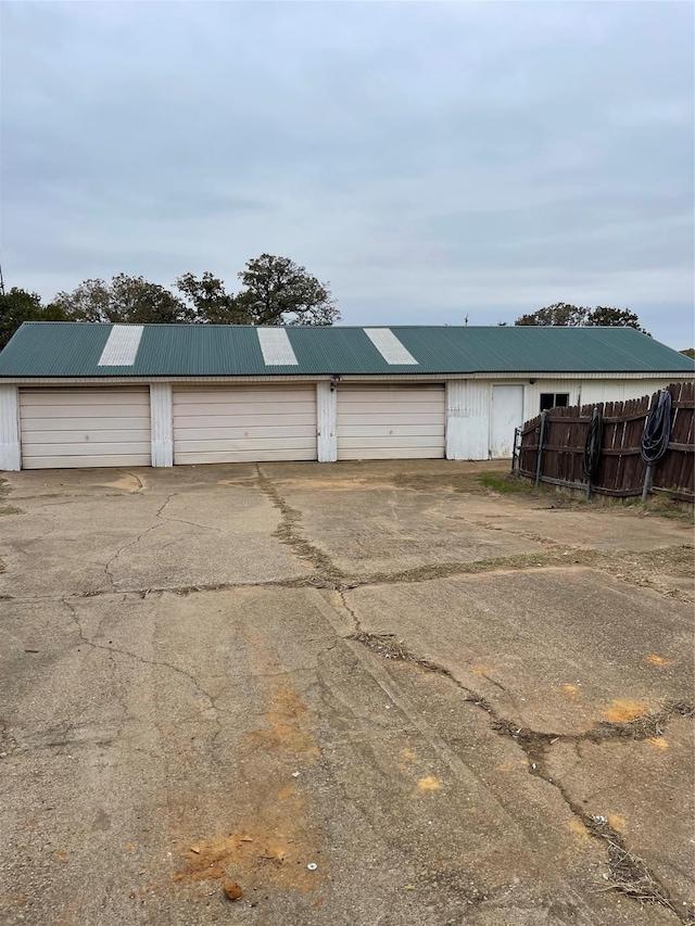 view of outdoor structure with a garage