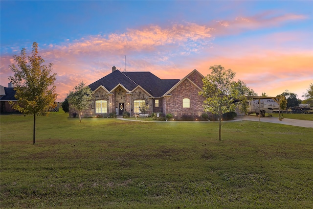 view of front of home featuring a yard