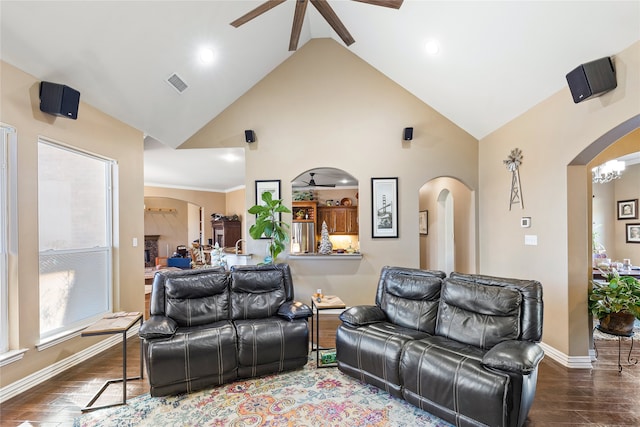 living room featuring ceiling fan, high vaulted ceiling, and dark hardwood / wood-style floors