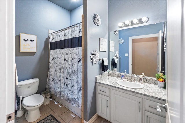 full bathroom with toilet, shower / bath combo, vanity, and tile patterned floors