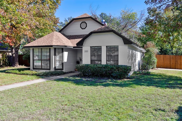 view of front of property with a front lawn