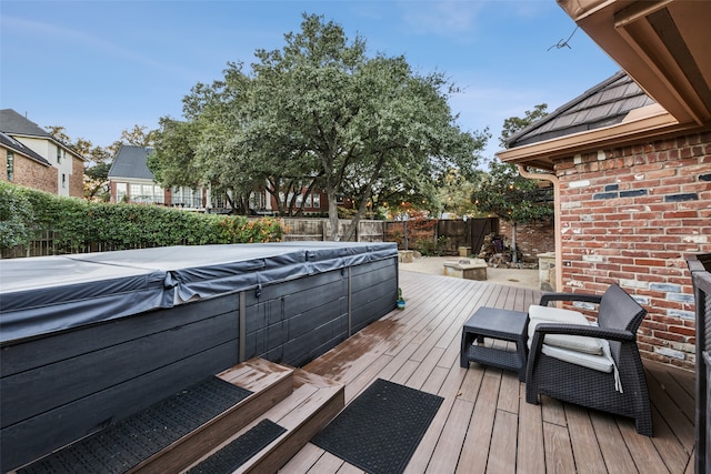 deck featuring a fire pit