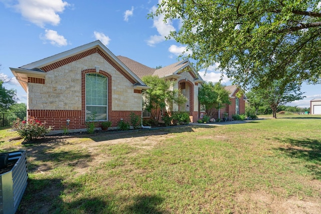 view of front of property with a front lawn