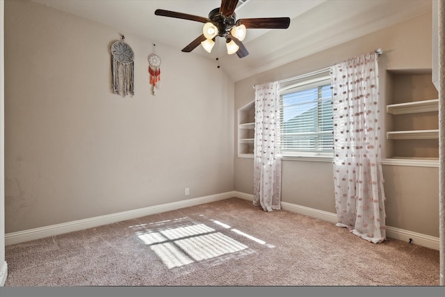 unfurnished bedroom with vaulted ceiling, ceiling fan, and carpet