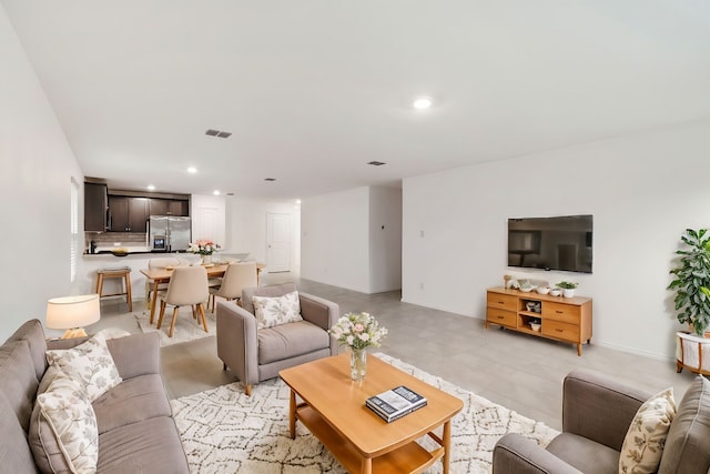 living room with light tile patterned floors