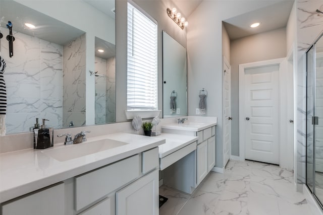 bathroom with an enclosed shower and vanity