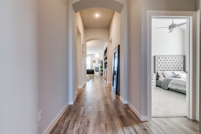 hallway featuring hardwood / wood-style floors