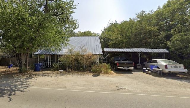 view of parking featuring a carport