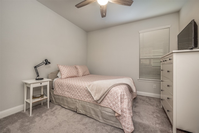 bedroom featuring ceiling fan and light colored carpet