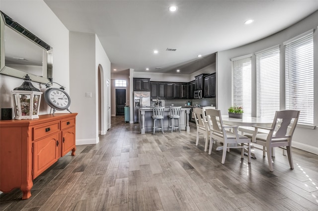 dining area featuring dark hardwood / wood-style floors