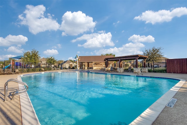 view of swimming pool with a gazebo and a patio area