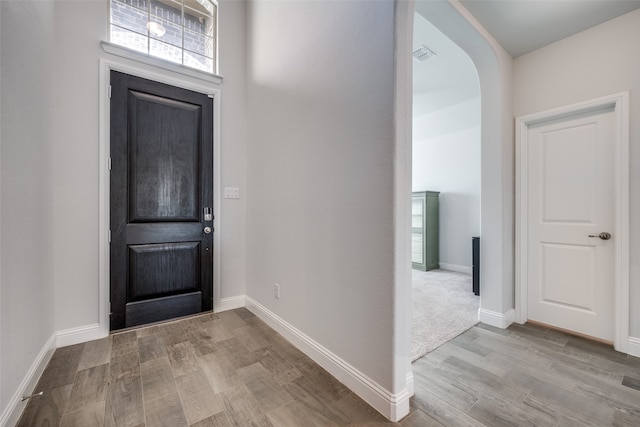 foyer with light hardwood / wood-style flooring