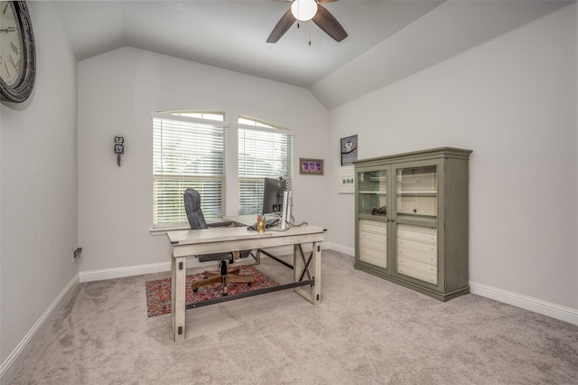 carpeted office with ceiling fan and vaulted ceiling