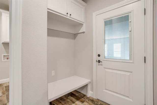 mudroom with dark hardwood / wood-style floors