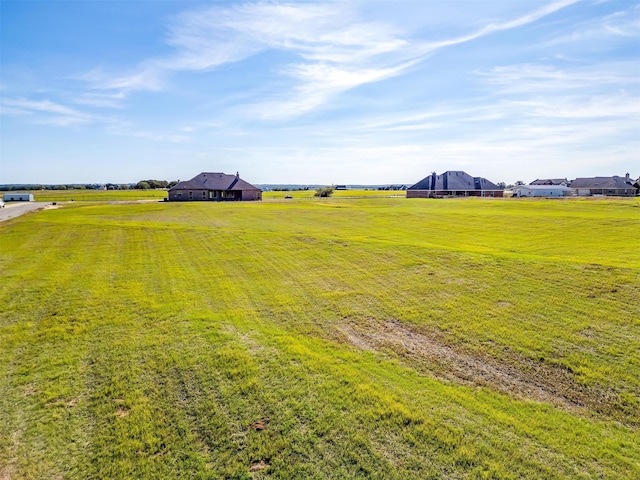 view of yard featuring a rural view