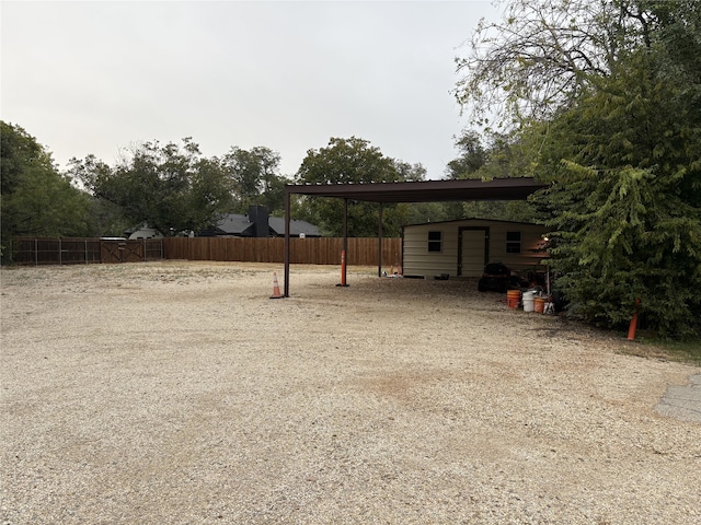 view of yard with a storage unit