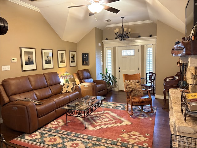 living room featuring dark wood-type flooring, ceiling fan with notable chandelier, vaulted ceiling, and ornamental molding