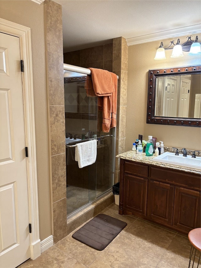 bathroom with vanity and an enclosed shower