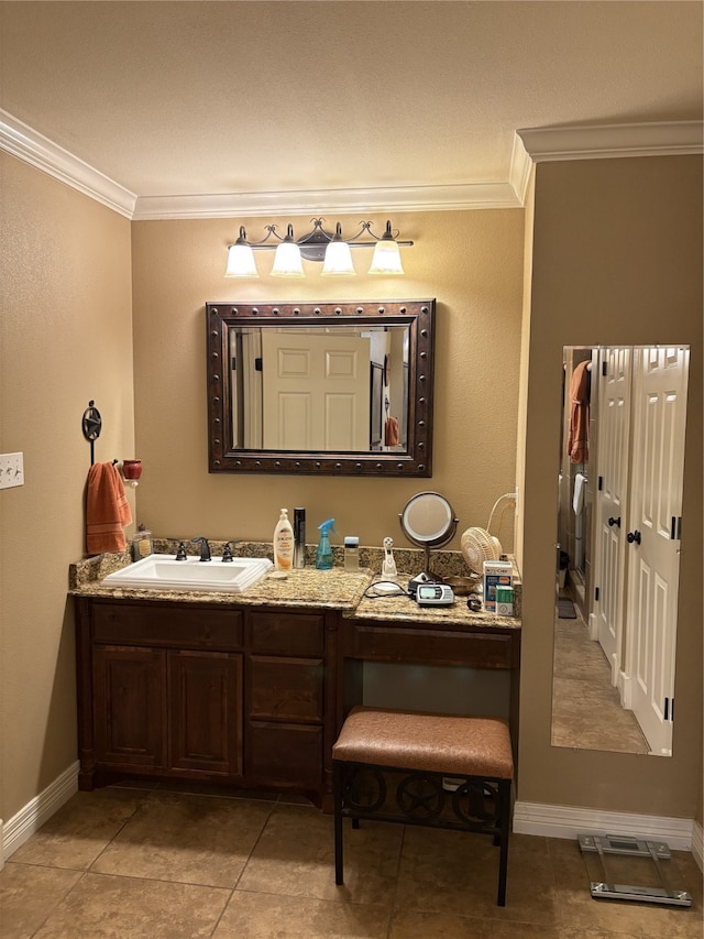 bathroom with vanity, tile patterned floors, and crown molding