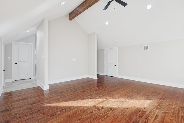 interior space featuring hardwood / wood-style floors, ceiling fan, and vaulted ceiling with beams