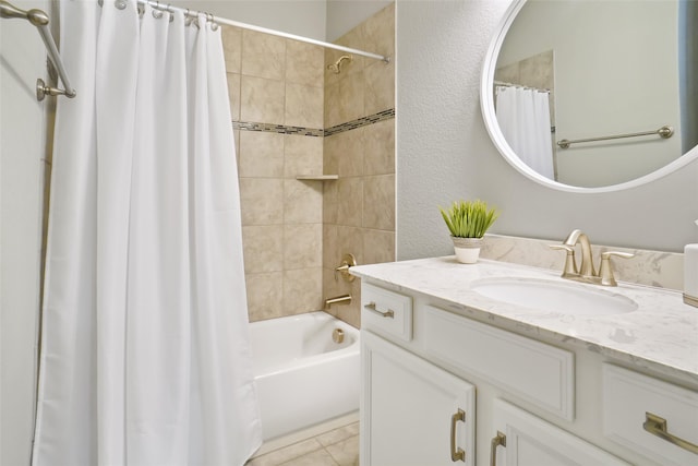 bathroom with tile patterned floors, vanity, and shower / bath combo