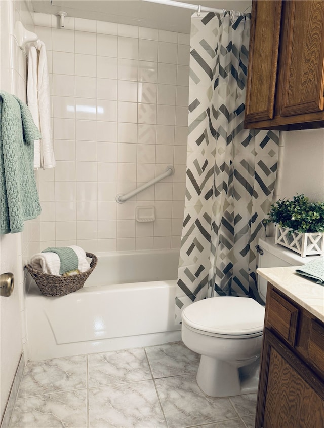 full bathroom featuring vanity, shower / bath combo, and toilet