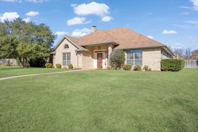 view of front of property with a front lawn