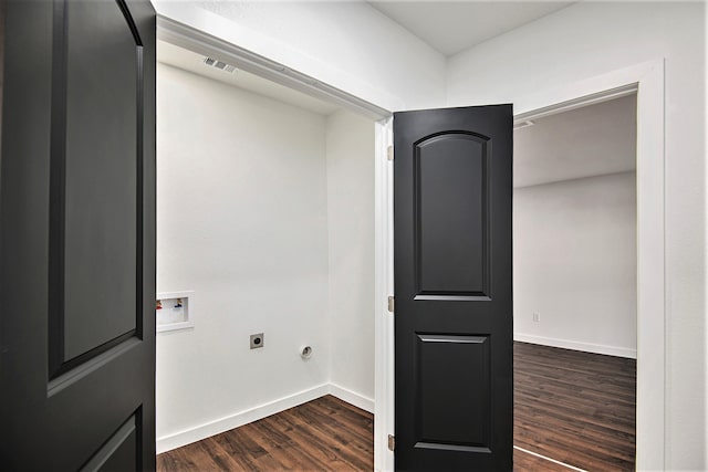 laundry room featuring electric dryer hookup, dark wood-type flooring, and hookup for a washing machine