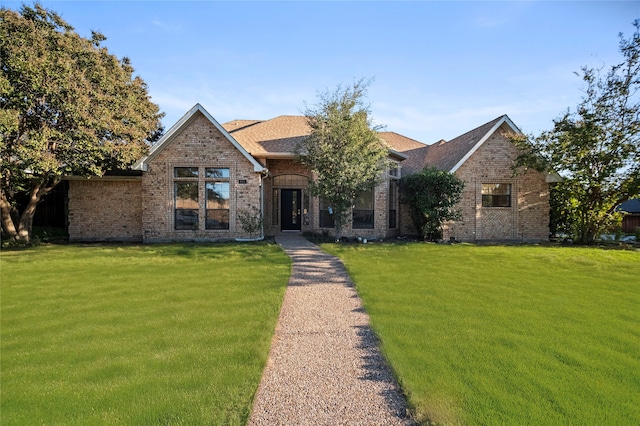 view of front of home with a front lawn