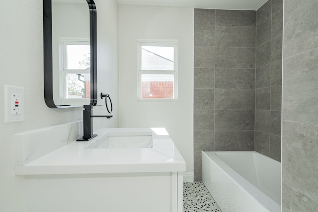 bathroom featuring tile patterned floors, plenty of natural light, and vanity