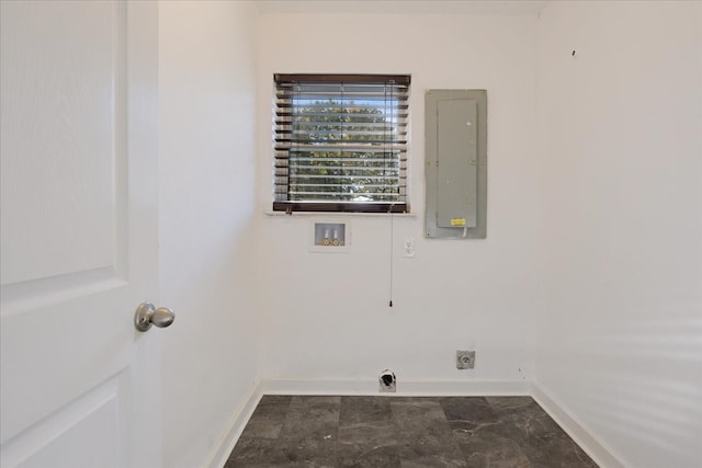 washroom with electric panel, electric dryer hookup, and hookup for a washing machine