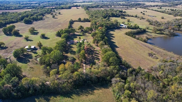 bird's eye view with a rural view and a water view