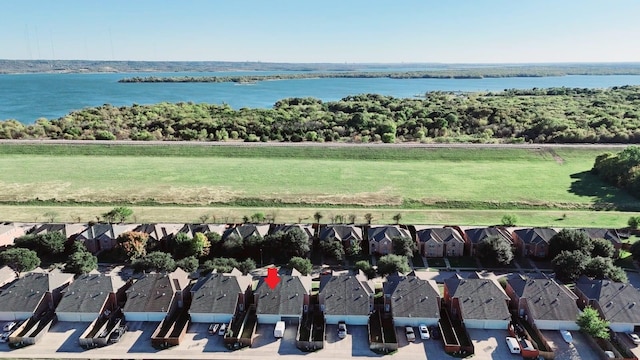 bird's eye view featuring a water view and a residential view