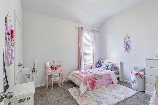 carpeted bedroom featuring lofted ceiling