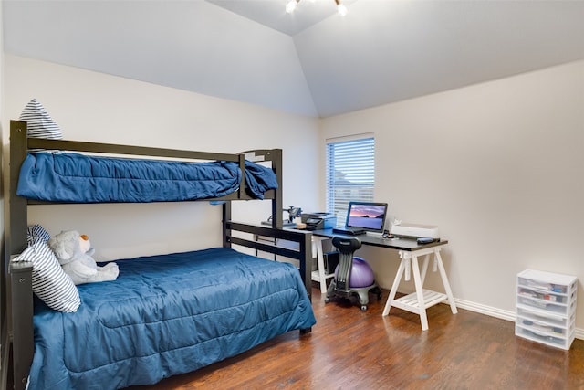 bedroom featuring dark hardwood / wood-style floors and vaulted ceiling