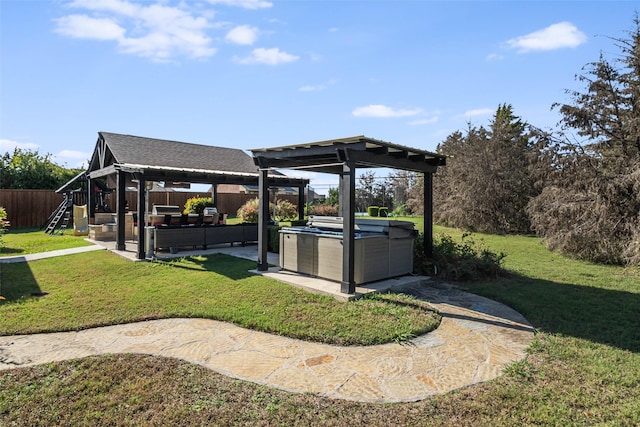 view of yard with a gazebo, an outdoor living space, a patio, and a hot tub