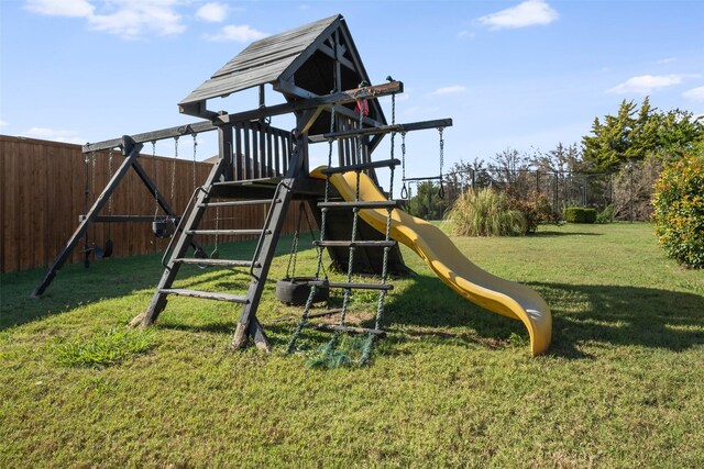 view of playground featuring a yard